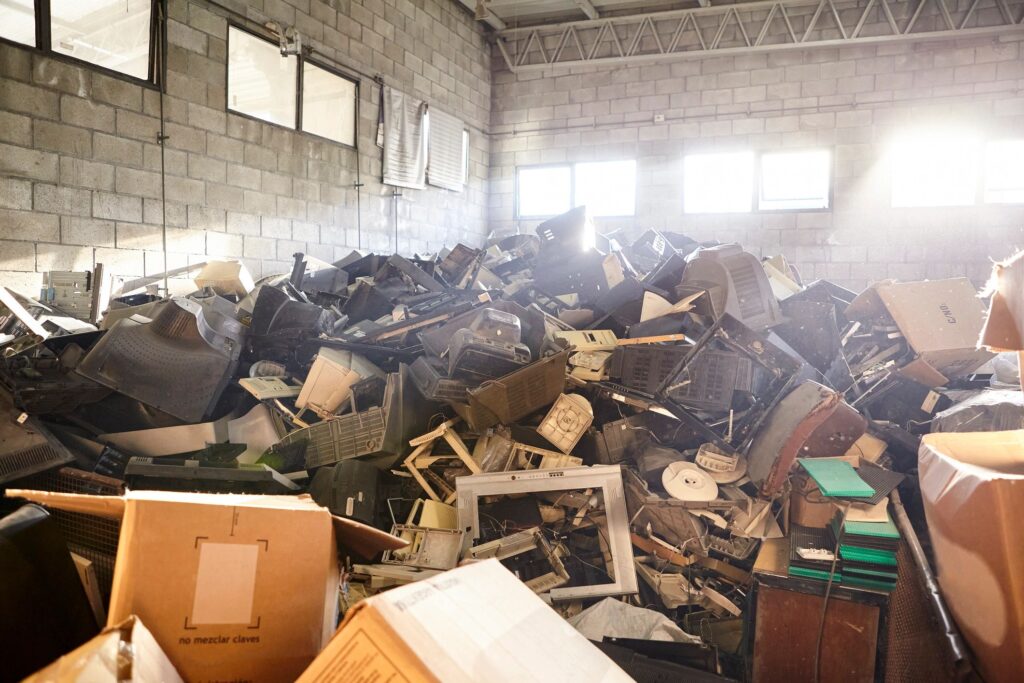 A heap of electronic waste in recycling plant